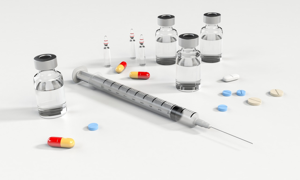 pills, syringe and vials used in liquid particle counter use