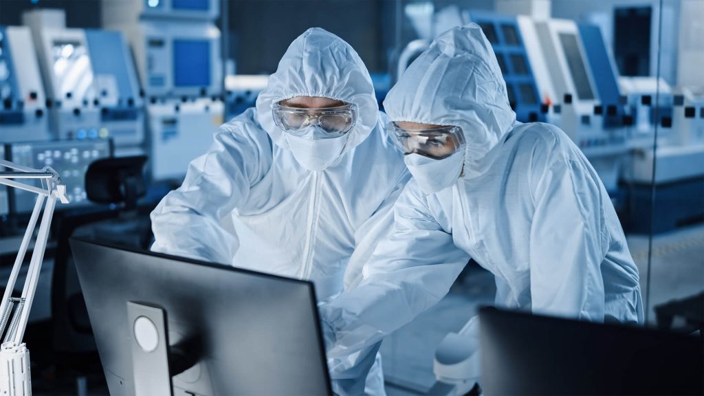 cleanroom techs using lighthouse worldwide solutions software