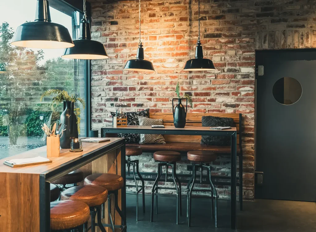 A photograph of a small urban cafe dining room.